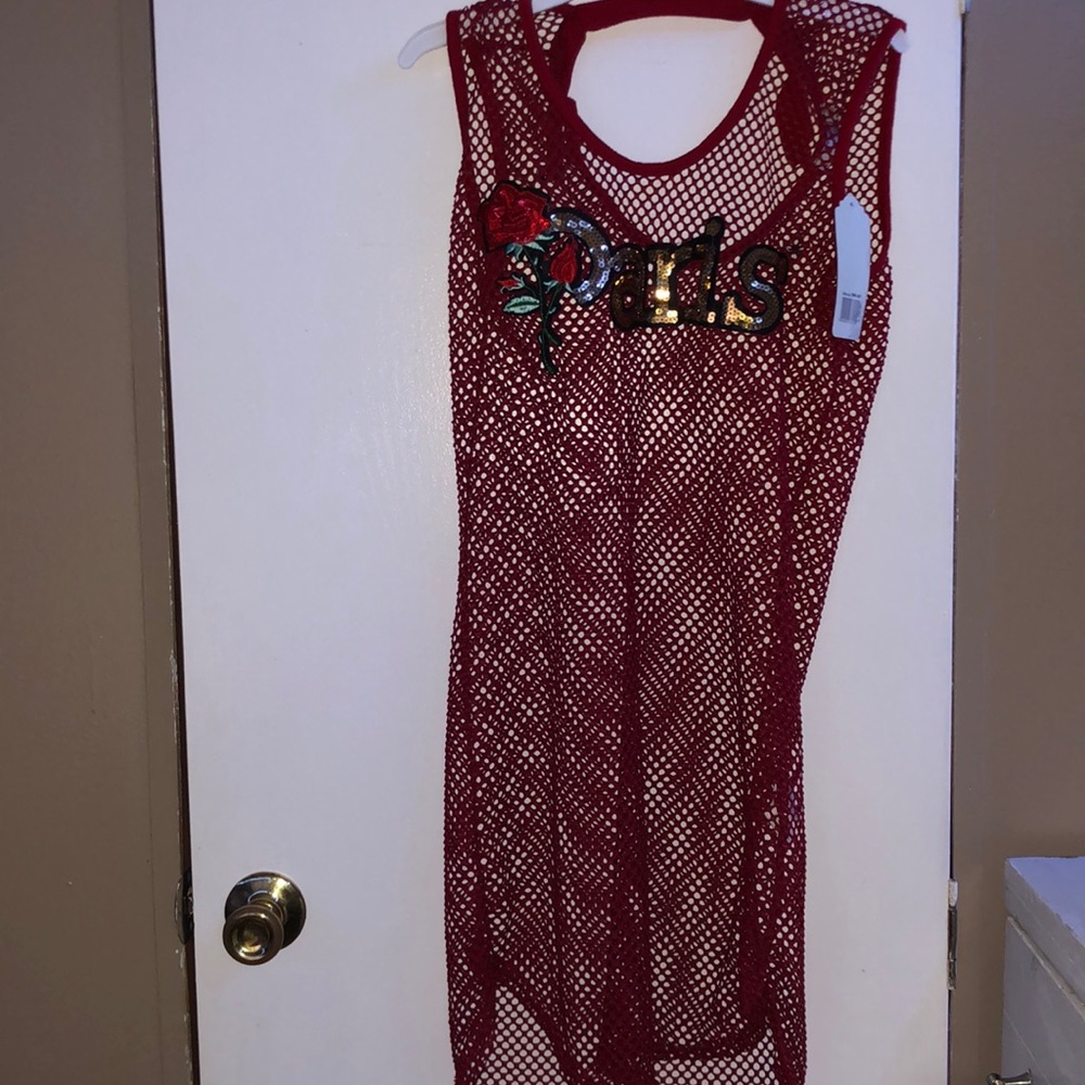 Mesh dress that you can wear with a plain dress! Very limited brand too!